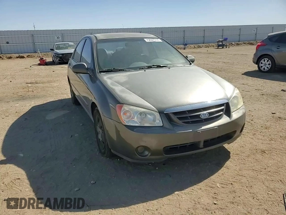 2006 Kia Spectra EX with VIN KNAFE122X65277053, listed as a Copart auction lot 75697314 with 147,156 mi miles and Salvage Title. Bid and sale history available at carsss.com. Image 11.