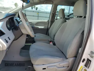 2014 Toyota Sienna L with VIN 5TDZK3DCXES463632, listed as a Copart auction lot 69957284 with 206,250 mi miles and Salvage Title. Bid and sale history available at carsss.com. Image 7.