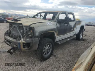 2018 GMC Sierra 2500HD SLT z VIN 1GT12TEY1JF108589, wystawiony jako Copart lot #52713975 z przebiegiem Nie podano mil oraz Nie do naprawy • Non repairable. Historia ofert i sprzedaży dostępna na DreamBid. Obrazek 1.