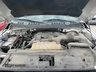 2018 Ford F-150 XL z VIN 1FTMF1CP1JKC24267, wystawiony jako Copart lot #69397665 z przebiegiem 124 532 mil mil oraz Szkoda całkowita • Salvage title. Historia ofert i sprzedaży dostępna na DreamBid. Obrazek 15.