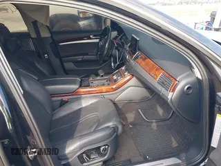 2012 Audi A8 with VIN WAUAVAFD8CN029546, listed as a IAAI auction lot 42216382 with 144,989 mi miles and . Bid and sale history available at DreamBid. Image 5.