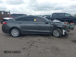 2016 Ford Fusion SE Hybrid with VIN 3FA6P0LU1GR191528, listed as a IAAI auction lot 42283058 with Not provided miles and . Bid and sale history available at DreamBid. Image 12.