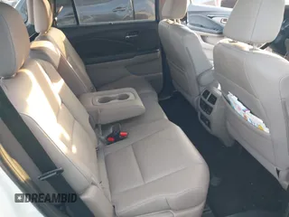 2019 Honda Pilot Touring 8-Passenger with VIN 5FNYF5H97KB005203, listed as a IAAI auction lot 41399930 with 47,267 mi miles and . Bid and sale history available at DreamBid. Image 8.