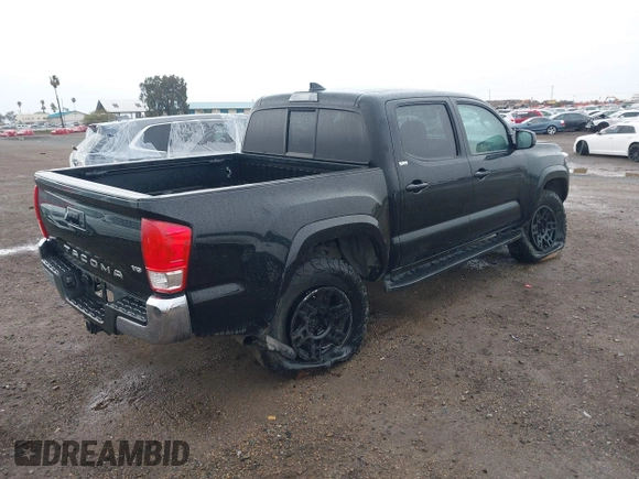 2017 Toyota Tacoma SR5 with VIN 5TFAZ5CN2HX040954, listed as a IAAI auction lot 41733137 with 97,780 mi miles and . Bid and sale history available at DreamBid. Image 4.