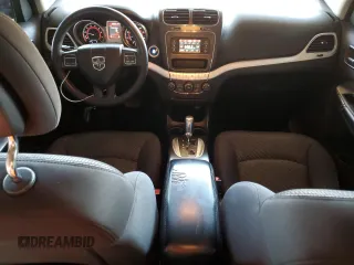 2013 Dodge Journey SE with VIN 3C4PDCAB4DT575943, listed as a Copart auction lot 48760385 with 127,081 mi miles and Salvage Title. Bid and sale history available at carsss.com. Image 8.