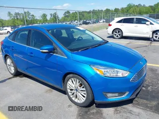 2015 Ford Focus Titanium with VIN 1FADP3J24FL322247, listed as a IAAI auction lot 41998030 with 151,341 mi miles and . Bid and sale history available at carsss.com. Image 1.