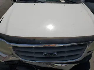 2003 Ford F-150 XL with VIN 2FTRX17L23CA17128, listed as a Copart auction lot 60144965 with 121,055 mi miles and Salvage title. Bid and sale history available at DreamBid. Image 11.