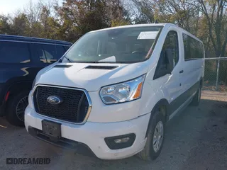 2021 Ford Transit Passenger Wagon XL with VIN 1FBAX2Y89MKA49850, listed as a IAAI auction lot 41602893 with 74,248 mi miles. Bid and sale history available at carsss.com. Image 17.