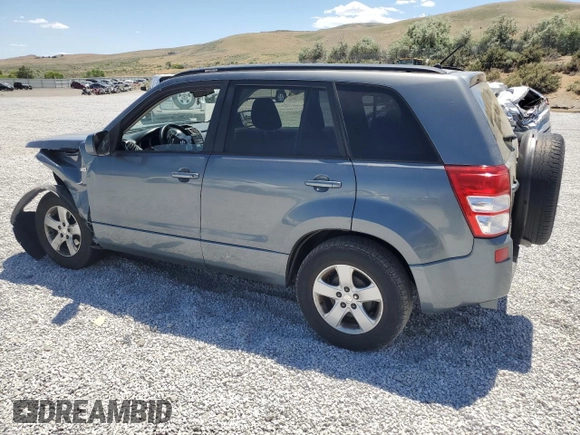 2006 Suzuki Grand Vitara Premium with VIN JS3TD943964102832, listed as a Copart auction lot 59971694 with 148,329 mi miles and Salvage title. Bid and sale history available at DreamBid. Image 2.