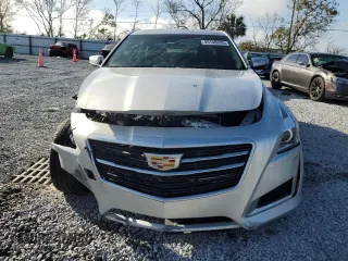 2016 Cadillac CTS Luxury Collection AWD with VIN 1G6AX5SX4G0101062, listed as a Copart auction lot 45140335 with 77,591 mi miles and Salvage Title. Bid and sale history available at DreamBid. Image 5.