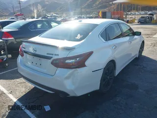 2018 Nissan Altima S with VIN 1N4AL3AP5JC294610, listed as a IAAI auction lot 41436696 with 124,835 mi miles and . Bid and sale history available at DreamBid. Image 4.