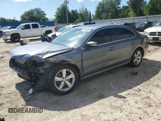 2013 Volkswagen Passat SE with VIN 1VWBH7A31DC137405, listed as a Copart auction lot 61409395 with 155,877 mi miles and Salvage title. Bid and sale history available at DreamBid. Image 1.