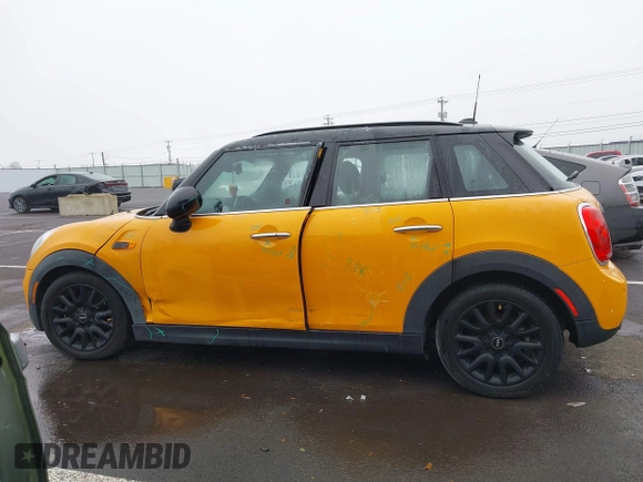 2018 MINI Hardtop 4 Door Cooper with VIN WMWXU1C59J2F79169, listed as a IAAI auction lot 40973679 with 97,507 mi miles and . Bid and sale history available at DreamBid. Image 14.