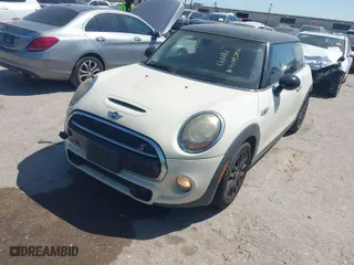 2015 MINI Cooper Hardtop S with VIN WMWXP7C50F2A34429, listed as a IAAI auction lot 41992816 with 160,316 mi miles. Bid and sale history available at carsss.com. Image 2.