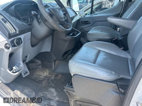 2016 Ford Transit Cargo with VIN 1FTYE1YM2GKB48795, listed as a IAAI auction lot 42854425 with 198,381 mi miles and . Bid and sale history available at DreamBid. Image 13.
