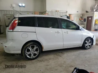 2010 Mazda 5 Sport with VIN JM1CR2W3XA0374407, listed as a Copart auction lot 61870014 with 196,210 mi miles and Salvage Title. Bid and sale history available at DreamBid. Image 3.