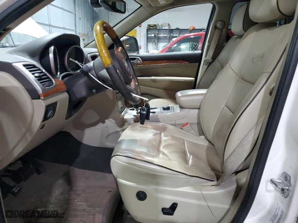 2012 Jeep Grand Cherokee Overland with VIN 1C4RJFCT5CC185100, listed as a Copart auction lot 42745615 with 126,696 mi miles and Salvage Title. Bid and sale history available at carsss.com. Image 7.