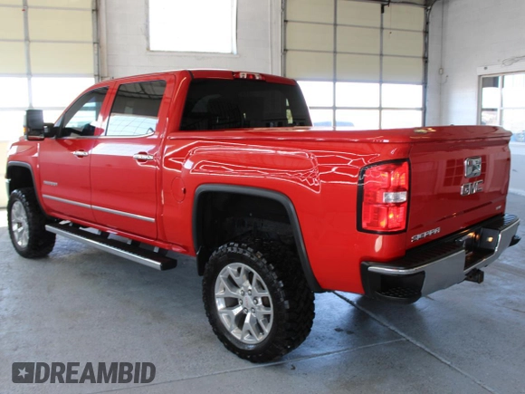 2015 GMC Sierra 1500 SLT with VIN 3GTU2VEJ2FG368016, listed as a Copart auction lot 53698605 with 91,980 mi miles and Salvage Title. Bid and sale history available at DreamBid. Image 4.