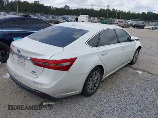 2016 Toyota Avalon XLE Premium z VIN 4T1BD1EB0GU056337, wystawiony jako IAAI lot #42110091 z przebiegiem 296 715 mil mil oraz . Historia ofert i sprzedaży dostępna na DreamBid. Obrazek 4.