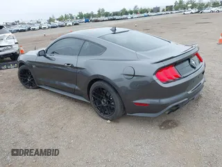 2020 Ford Mustang EcoBoost with VIN 1FA6P8TD1L5184204, listed as a IAAI auction lot 42421848 with 94,492 mi miles and . Bid and sale history available at DreamBid. Image 3.