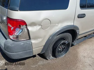 2004 Ford Explorer XLS z VIN 1FMZU72E14UC11599, wystawiony jako IAAI lot #41749597 z przebiegiem 82 805 mil mil oraz . Historia ofert i sprzedaży dostępna na DreamBid. Obrazek 18.