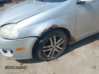 2006 Volkswagen Jetta 2.5L z VIN 3VWRF71K76M707615, wystawiony jako IAAI lot #42070579 z przebiegiem 180 873 mil mil oraz . Historia ofert i sprzedaży dostępna na DreamBid. Obrazek 6.