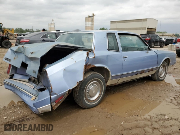 1984 Chevrolet Monte Carlo z VIN 1G1AZ37H3ER221496, wystawiony jako Copart lot #54297665 z przebiegiem 91 351 mil mil oraz Szkody całkowita. Historia ofert i sprzedaży dostępna na DreamBid. Obrazek 3.