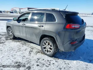 2014 Jeep Cherokee Latitude with VIN 1C4PJLCS8EW142983, listed as a IAAI auction lot 41569094 with 1 mi miles. Bid and sale history available at carsss.com. Image 3.