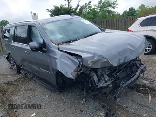 2022 Chevrolet Suburban z VIN 1GNSKCKT0NR296269, wystawiony jako IAAI lot #42190603 z przebiegiem 61 874 mil mil oraz . Historia ofert i sprzedaży dostępna na DreamBid. Obrazek 1.
