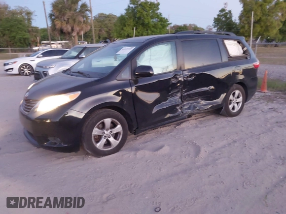 2015 Toyota Sienna LE AAS with VIN 5TDKK3DC2FS685245, listed as a IAAI auction lot 41849185 with 141,545 mi miles. Bid and sale history available at carsss.com. Image 2.