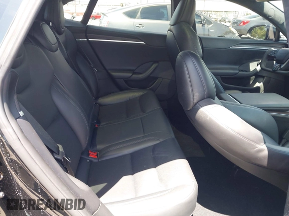 2022 Tesla Model S with VIN 5YJSA1E51NF464231, listed as a IAAI auction lot 42077838 with 53,290 mi miles and . Bid and sale history available at DreamBid. Image 8.