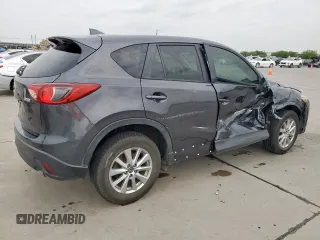 2016 Mazda CX-5 Touring z VIN JM3KE2CY7G0654292, wystawiony jako Copart lot #53433745 z przebiegiem 168 273 mil mil oraz Szkoda całkowita • Salvage title. Historia ofert i sprzedaży dostępna na DreamBid. Obrazek 3.