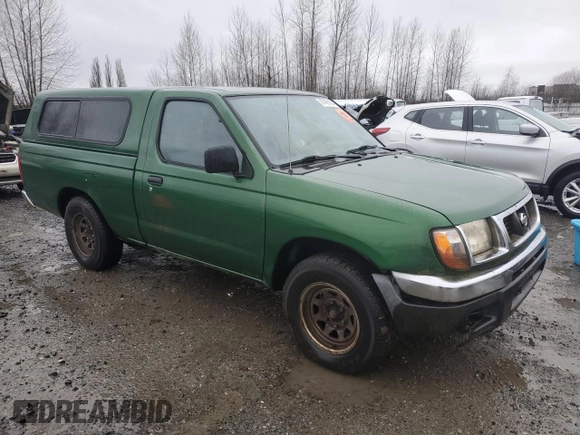 1998 Nissan Frontier XE with VIN 1N6DD21S4WC345165, listed as a Copart auction lot 87465104 with Not provided miles and Clean title. Bid and sale history available at DreamBid. Image 4.