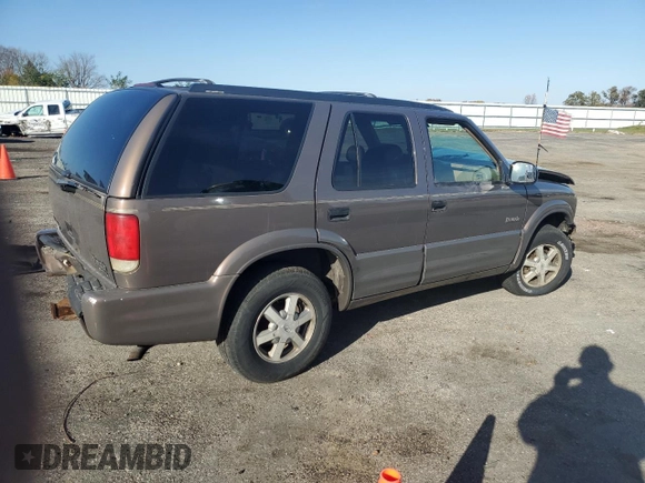 1998 Oldsmobile Bravada z VIN 1GHDT13W7W2702905, wystawiony jako Copart lot #77417944 z przebiegiem Nie podano mil oraz Nie do naprawy. Historia ofert i sprzedaży dostępna na DreamBid. Obrazek 3.