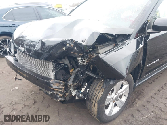 2015 Jeep Compass Latitude with VIN 1C4NJDEB3FD105704, listed as a IAAI auction lot 41719603 with 106,904 mi miles. Bid and sale history available at carsss.com. Image 6.