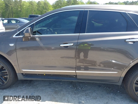 2019 Cadillac XT5 Luxury AWD z VIN 1GYKNDRS9KZ235687, wystawiony jako IAAI lot #41987360 z przebiegiem 78 784 mil mil oraz . Historia ofert i sprzedaży dostępna na DreamBid. Obrazek 15.