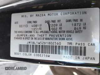 2013 Mazda 3 S Grand Touring with VIN JM1BL1W52D1802560, listed as a IAAI auction lot 41076496 with 97,126 mi miles and . Bid and sale history available at DreamBid. Image 9.