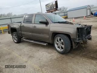 2015 Chevrolet Silverado 1500 LT with VIN 3GCPCREC3FG376385, listed as a Copart auction lot 50973385 with 148,545 mi miles and Salvage Title. Bid and sale history available at DreamBid. Image 4.