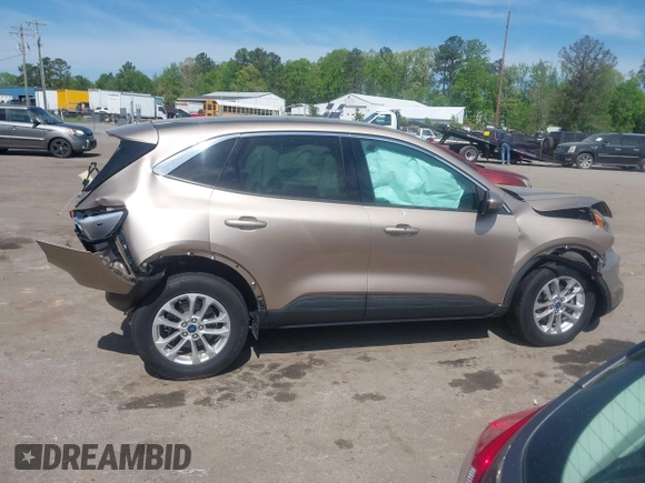 2020 Ford Escape SE with VIN 1FMCU9G6XLUA25108, listed as a IAAI auction lot 42106136 with 73,746 mi miles and . Bid and sale history available at DreamBid. Image 13.