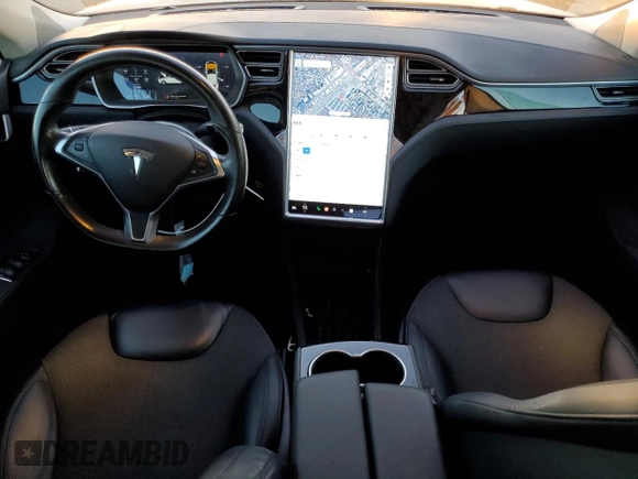 2015 Tesla Model S 85D with VIN 5YJSA1S21FF087461, listed as a Copart auction lot 87027334 with 53,868 mi miles and Salvage Title. Bid and sale history available at carsss.com. Image 8.