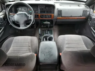1996 Jeep Grand Cherokee Laredo with VIN 1J4GZ58S9TC172760, listed as a Copart auction lot 86086644 with 220,037 mi miles and Clean Title. Bid and sale history available at carsss.com. Image 8.