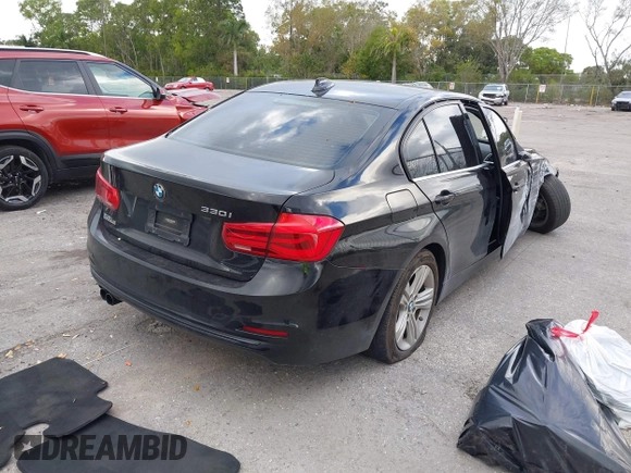 2017 BMW 3 Series 330i with VIN WBA8B9C38HK885309, listed as a IAAI auction lot 41579236 with 63,210 mi miles and . Bid and sale history available at DreamBid. Image 4.