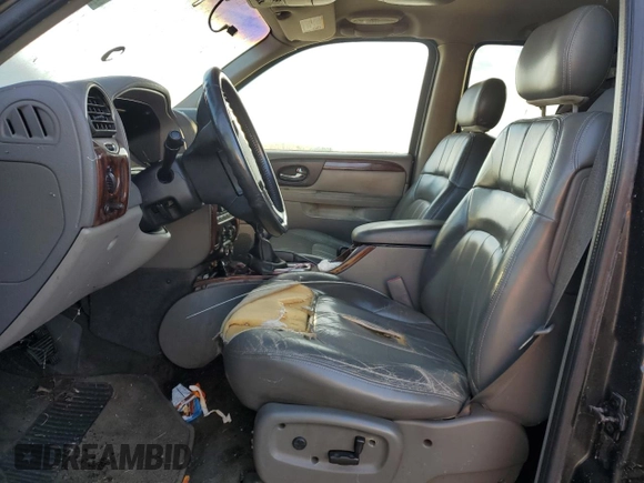 2003 GMC Envoy SLE with VIN 1GKDS13S632136015, listed as a Copart auction lot 79969194 with Not Provided miles and Clean Title. Bid and sale history available at DreamBid. Image 7.
