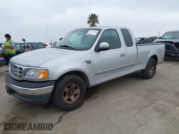 2000 Ford F-150 XL with VIN 1FTRX17W0YKA70861, listed as a IAAI auction lot 42096438 with 1 mi miles. Bid and sale history available at carsss.com. Image 14.