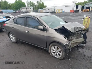 2012 Nissan Versa SV with VIN 3N1CN7AP3CL860116, listed as a IAAI auction lot 42329920 with 105,447 mi miles and . Bid and sale history available at DreamBid. Image 1.