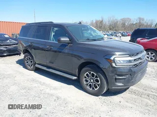 2023 Ford Expedition XLT with VIN 1FMJU1H84PEA14842, listed as a IAAI auction lot 41662667 with 51,083 mi miles. Bid and sale history available at carsss.com. Image 1.