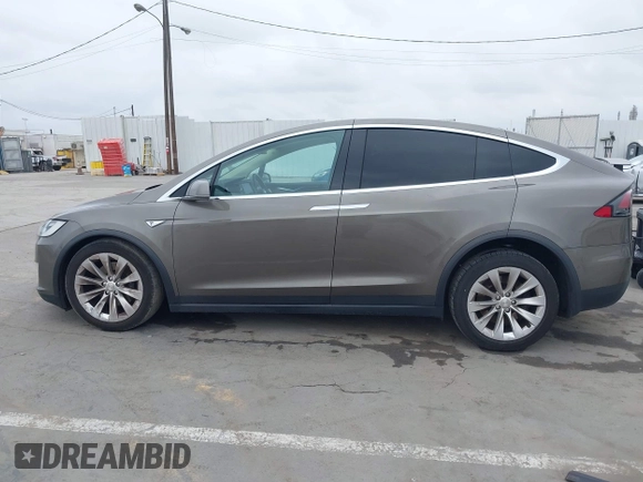 2016 Tesla Model X 70D with VIN 5YJXCBE22GF017499, listed as a IAAI auction lot 42192962 with 103,430 mi miles and . Bid and sale history available at DreamBid. Image 14.