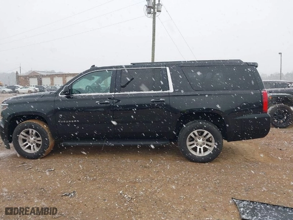 2016 Chevrolet Suburban LT with VIN 1GNSKHKC9GR112933, listed as a IAAI auction lot 41618685 with 188,921 mi miles. Bid and sale history available at carsss.com. Image 13.
