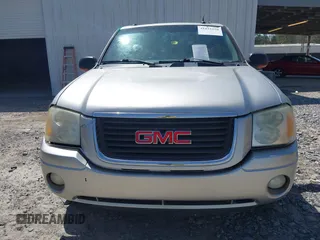 2005 GMC Envoy SLE with VIN 1GKDS13S652390259, listed as a IAAI auction lot 41825258 with 162,172 mi miles and . Bid and sale history available at DreamBid. Image 12.