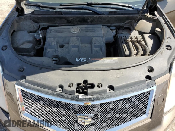 2014 Cadillac SRX Premium Collection z VIN 3GYFNDE37ES644966, wystawiony jako Copart lot #60501715 z przebiegiem 97 231 mil mil oraz Szkoda całkowita • Salvage title. Historia ofert i sprzedaży dostępna na DreamBid. Obrazek 11.
